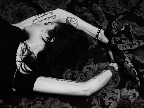 Frances Bean Cobain sports Al Columbia tattoo in gothy photos