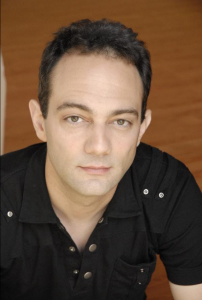 Professional portrait photograph of voice actor and director Mike McFarland, from IMDB