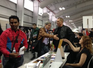 Paul Levitz stops to say hello to Bob Layton, Iron Man artist.