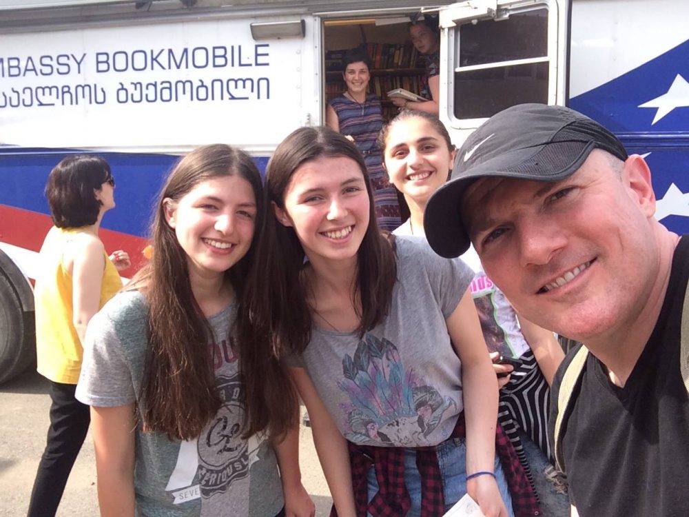 With the US Embassy Bookmobile at the Tserovani IDP settlement camp.