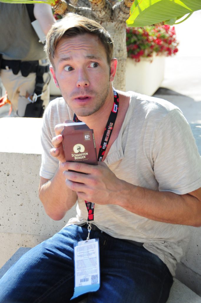 Author and Artist Ben Hatke, protecting his bar of chocolate.