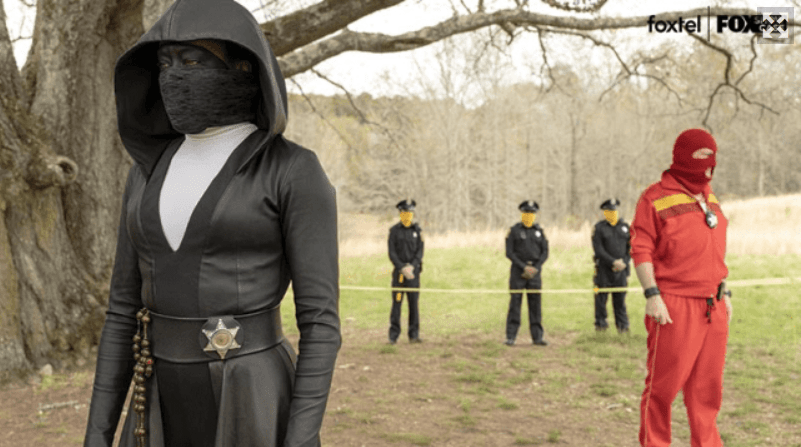 Angela and the police survey Judd's murder scene in Watchmen episode 2