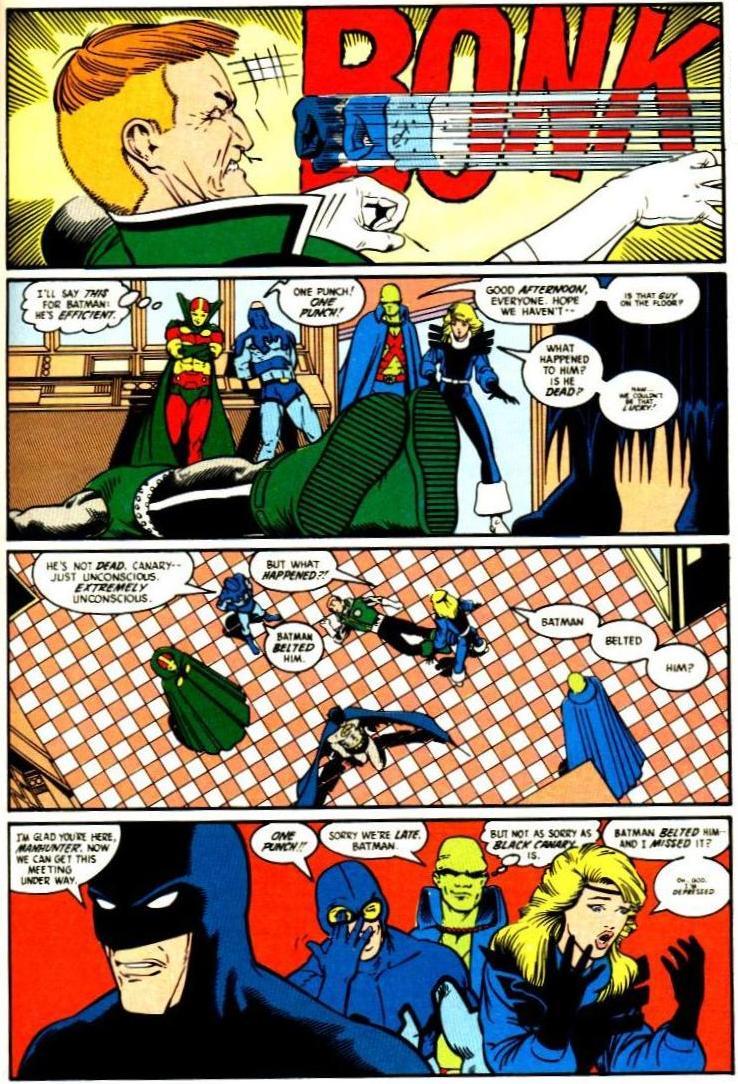 The classic Batman laying out Guy Gardner with one punch scene from Justice League #1