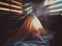 A spooky ghost all alone on Halloween