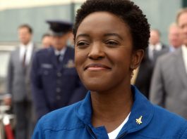 Dani Poole (Krys Marshall) greets the Russians in "Best Laid Plans"