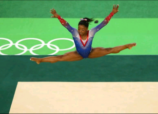 FANDOM FLAMES: Simone Biles and acceptance Simone Biles performs a floor exercise at Rio 2016