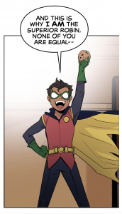 Damian triumphantly holding a cookie in Batman: Wayne Family Adventures Episode Two