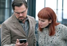 REVIEW: DON’T LOOK UP successfully captures That Funny Feeling, but still misses the mark Leonardo DiCaprio and Jennifer Lawrence in Don't Look Up