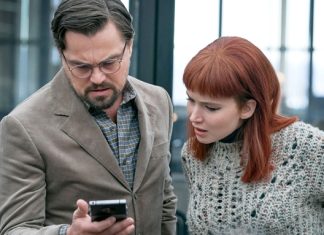REVIEW: DON’T LOOK UP successfully captures That Funny Feeling, but still misses the mark Leonardo DiCaprio and Jennifer Lawrence in Don't Look Up