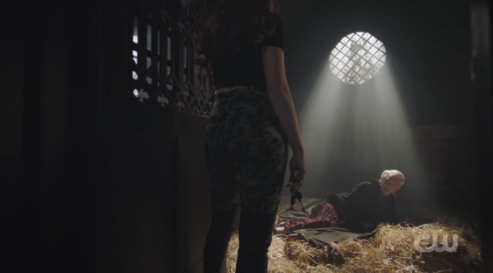 Abigail locks up Nana Rose in a room full of hay