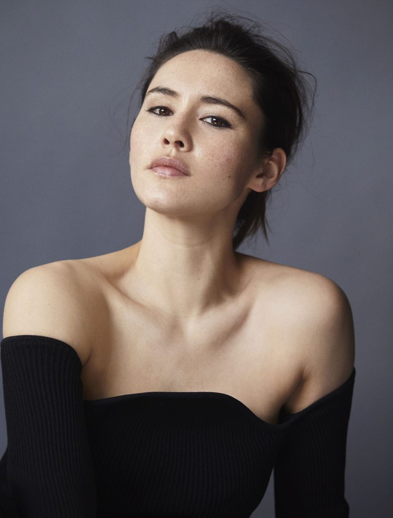 Christina Chong black dress headshot.