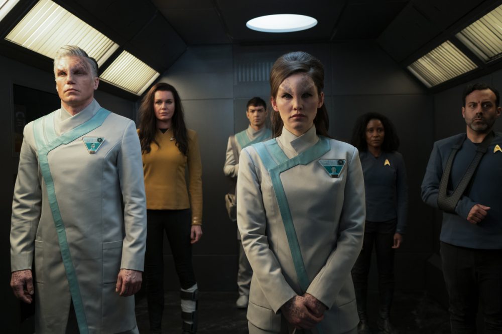 Anson Mount as Pike, Rebecca Romijn as Una, Ethan Peck as Spock, and Christina Chong as La'an of the Paramount+ original series STAR TREK: STRANGE NEW WORLDS. 