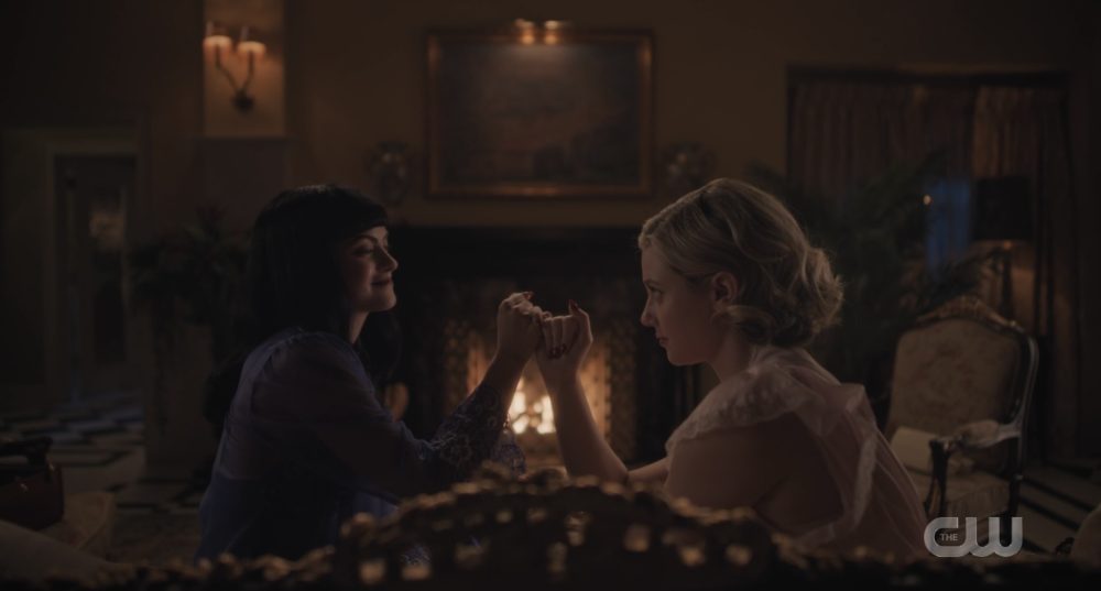 Veronica Lodge and Betty Cooper make a pinky promise to never be like their parents