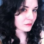 Photo of author Kristina Elyse Butke. A girl with brown-black hair and brown eyes and pale skin.