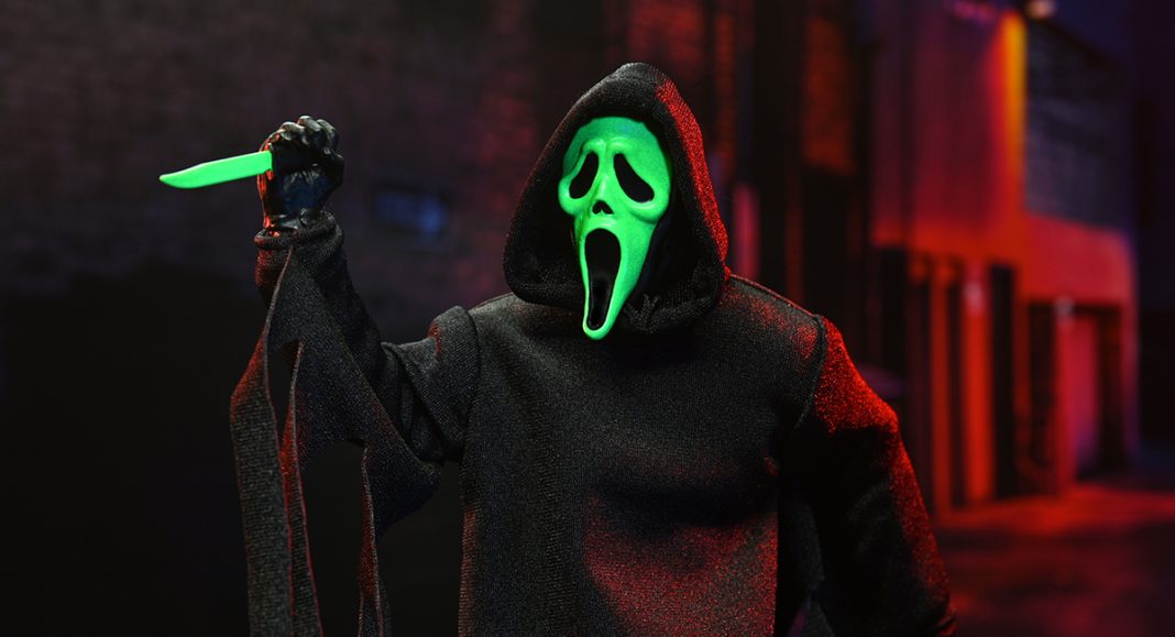 Glow in the dark Ghost Face figure with knife
