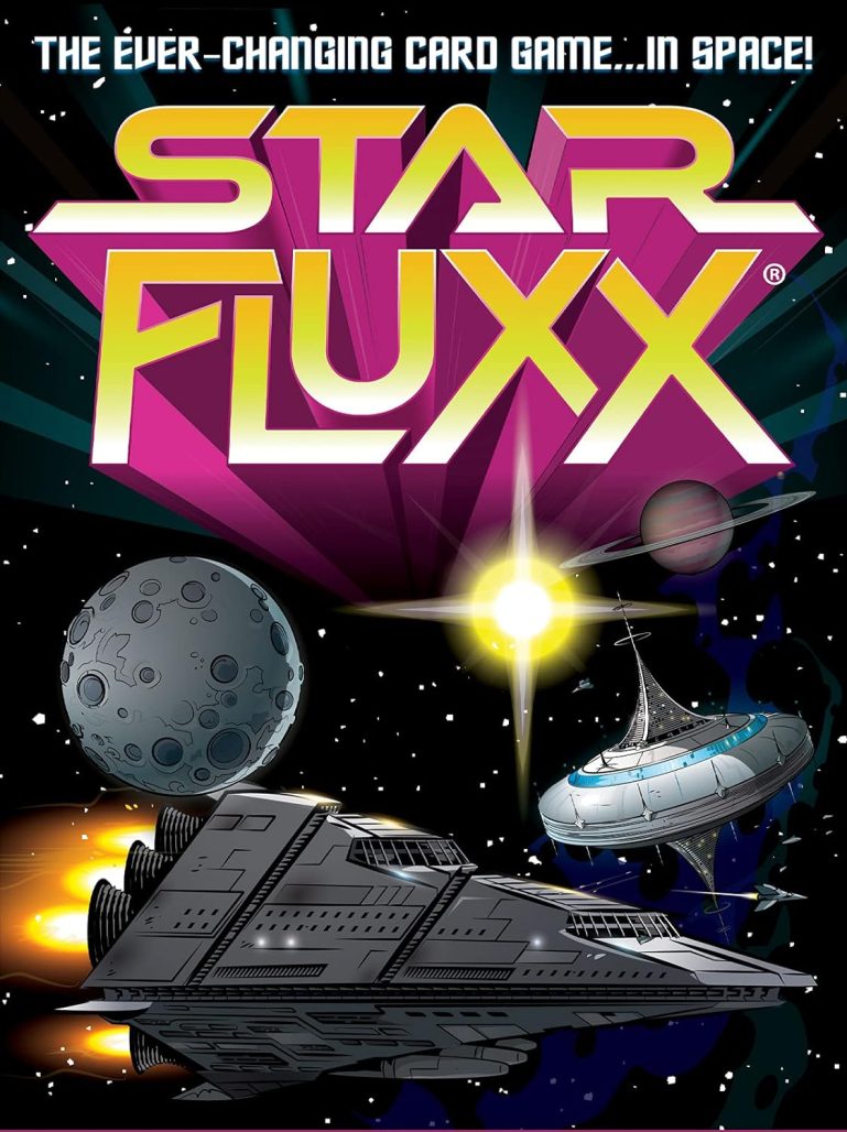 The cover of a box of Star Flux. The name of the game is in yellow with purple shadows, there's a pair of gray starships, two planets, and a bright star against the black of space