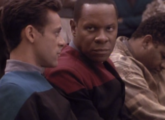 STAR TREK: DEEP SPACE NINE: Countdown to the Bell Riots Julian Bashir (Alexander Siddig) and Ben Sisko (Avery Brooks) in a Sanctuary District in San Francisco, 2024. From Star Trek: Deep Space Nine, "Past Tense."