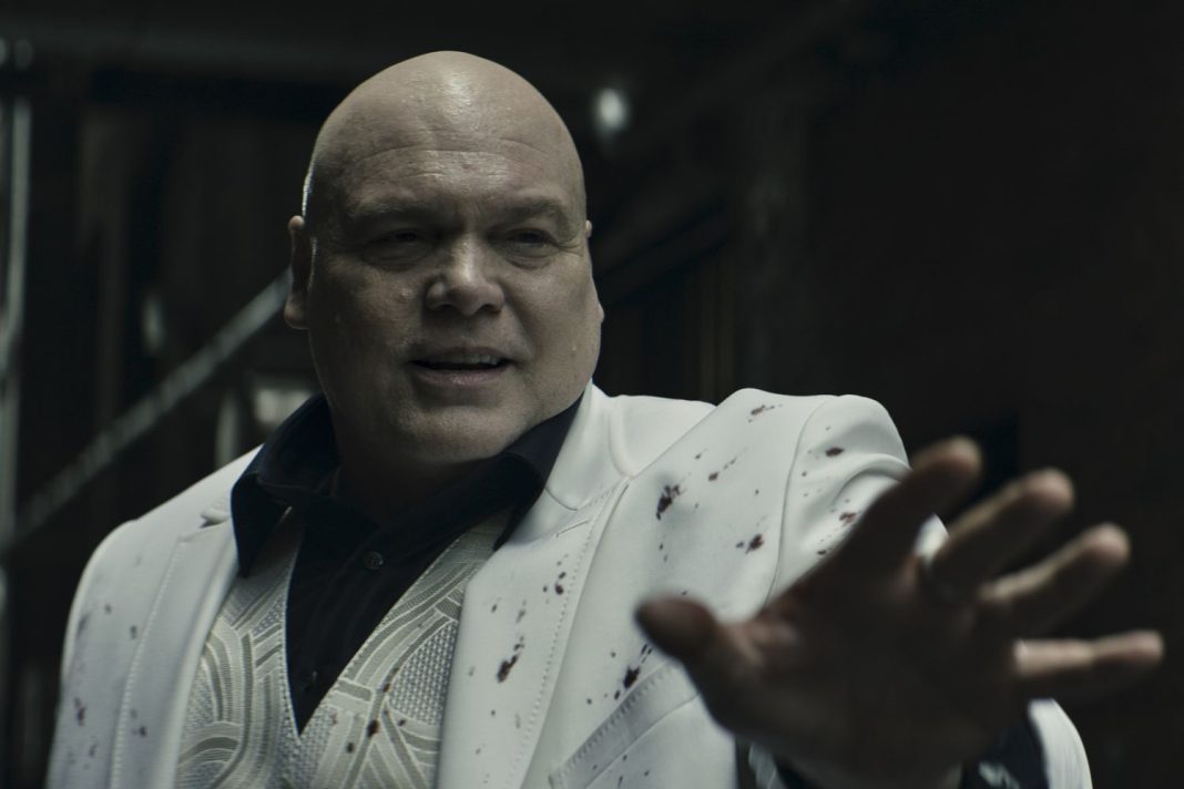 Kingpin in a white suit stained in blood in Marvel's Echo