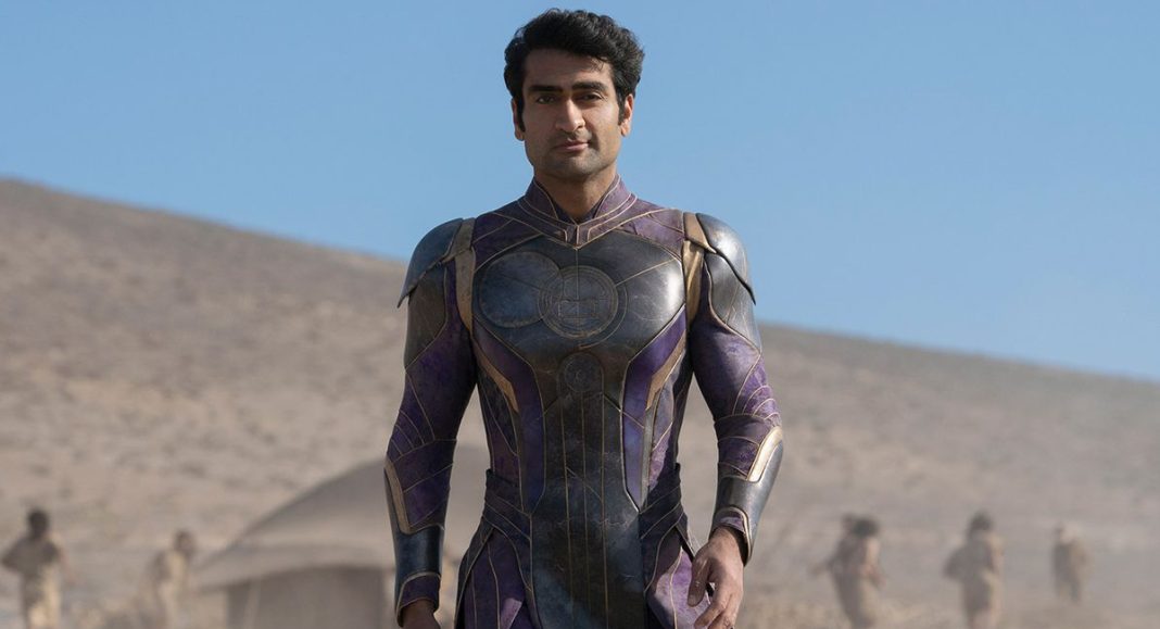 kumail nanjiani as Kingo walking in the desert in the eternals