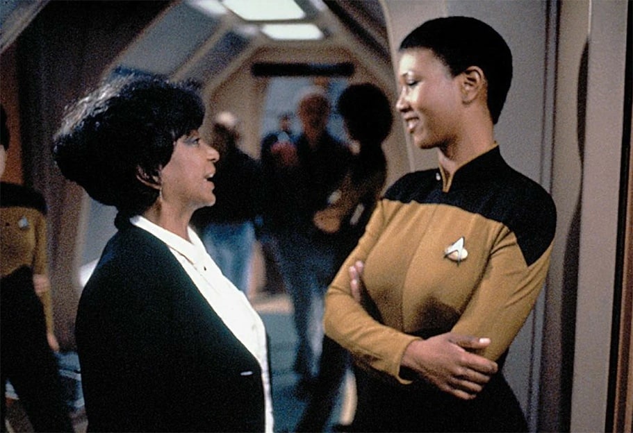 Dr. Mae C. Jemison talks to Nichelle Nichols on the set of Star Trek: The Next Generation.
