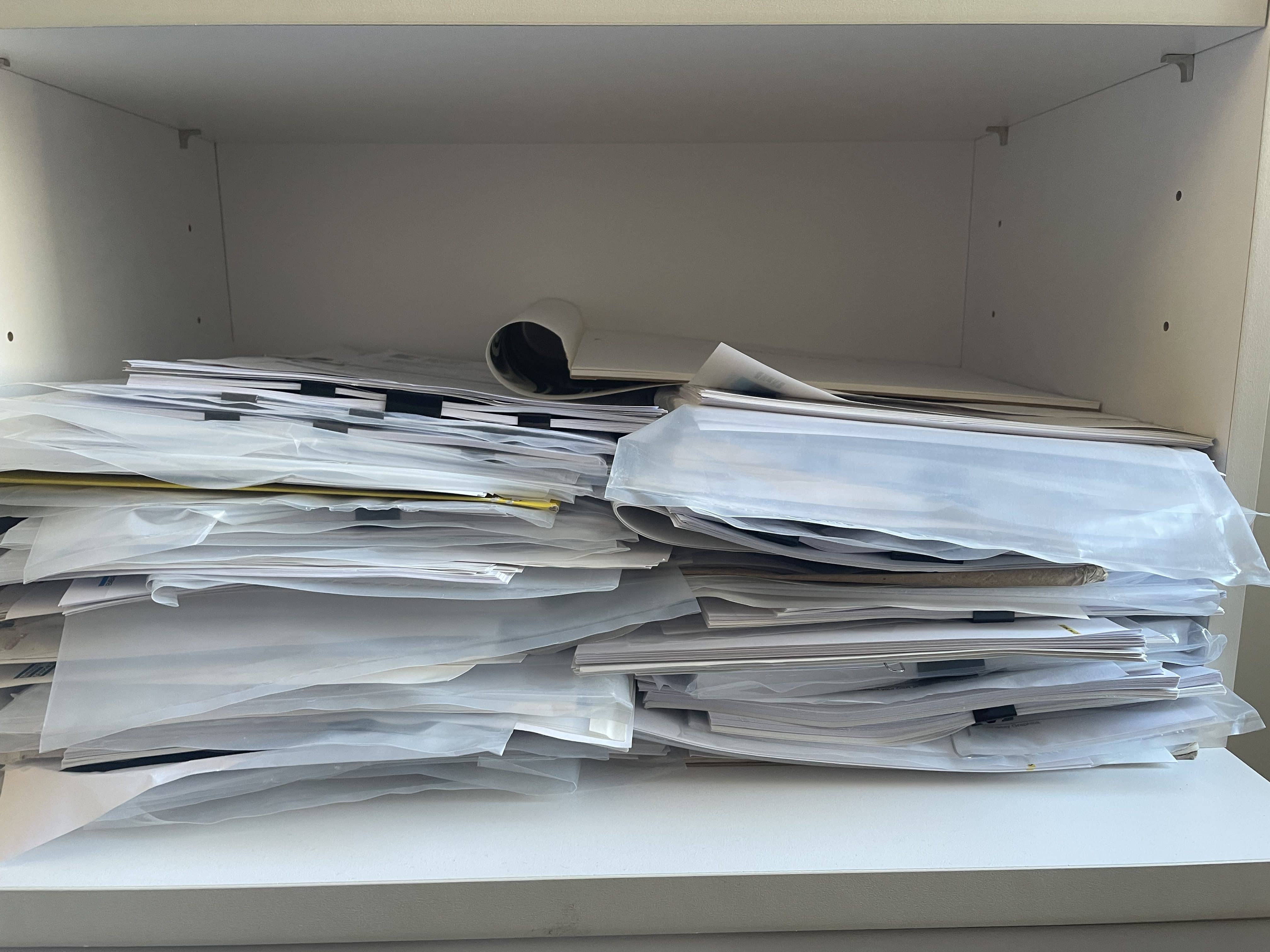 Image shows a pile of papers. Credit: First Second