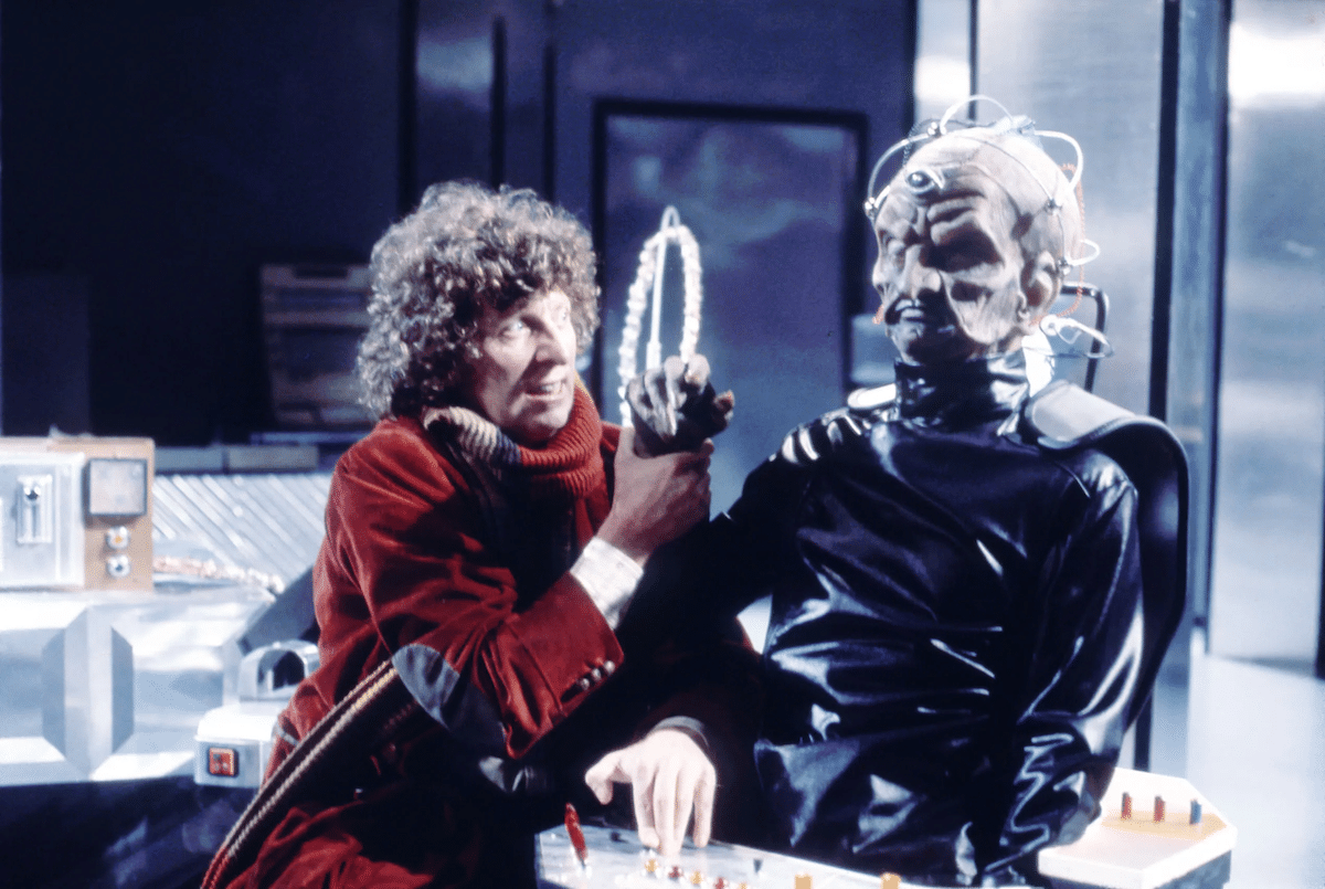 Tom Baker as the Fourth Doctor confronting Davros in Genesis of the Daleks