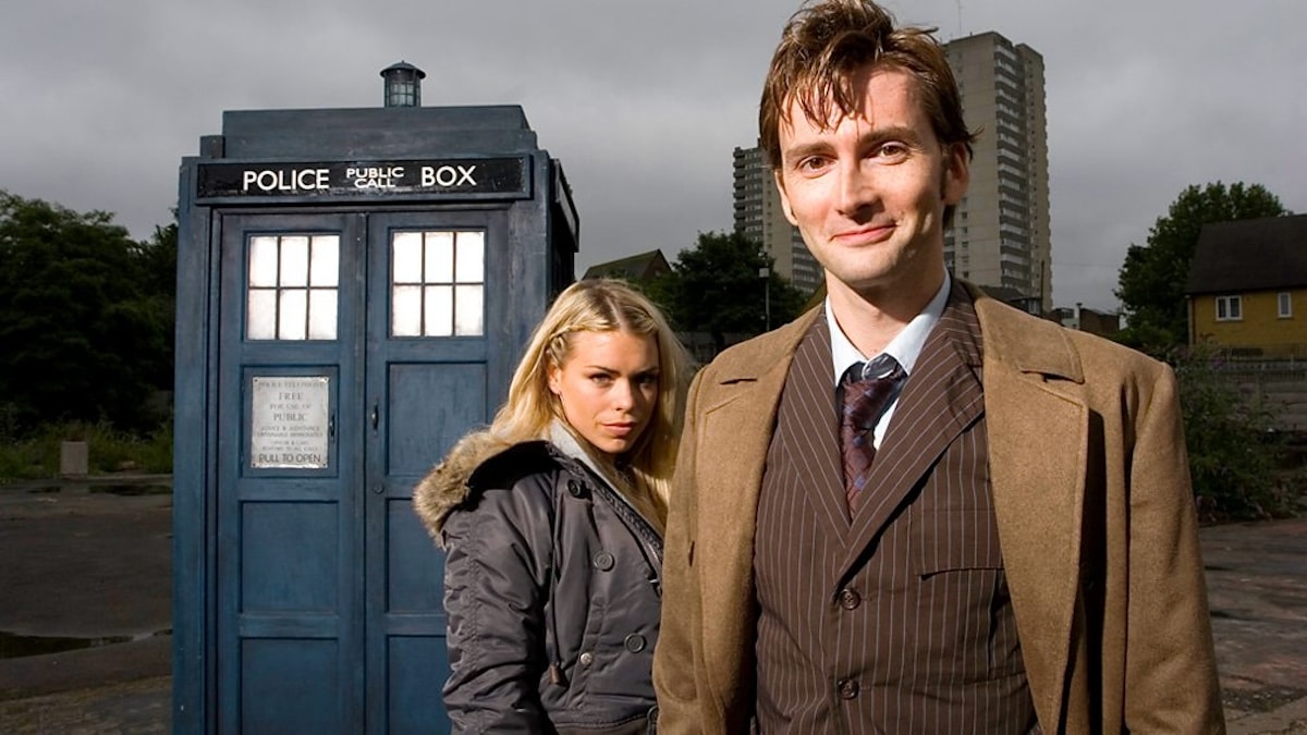 Billie Pipe as Rose Tyler and David Tennant as the Tenth Doctor in front of the TARDIS