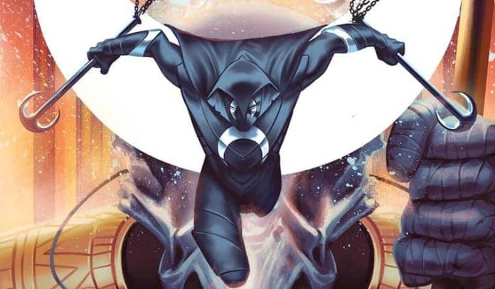 image003 Moonknight stands against a moon.