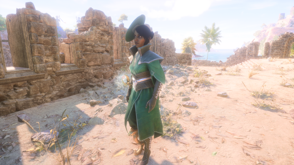 A south Asian woman wearing a fancy side hat and green robes stands in ruins near the beach. She has a golden prosthetic right leg.