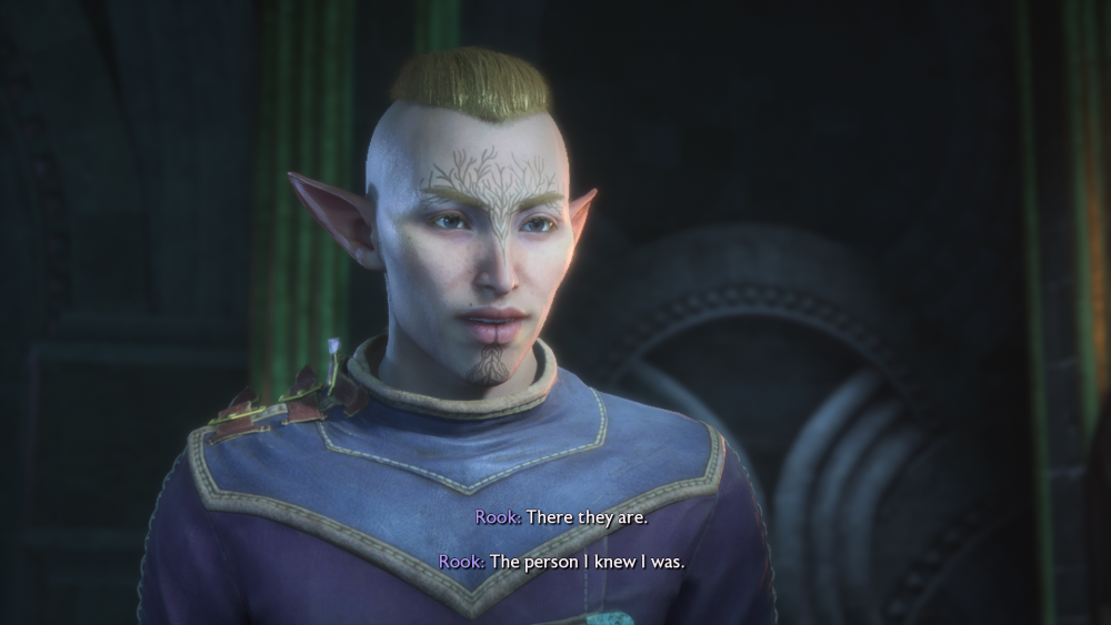 A nonbinary Dalish Elf Rook faces the screen and says "There they are. The person I knew I was." They have blond hair with shaved sides, and the markings of Mythal on their face.