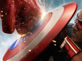 The Red Hulk's fist is smashing against Captain America's shield, held by Anthony Mackie's Captain America.