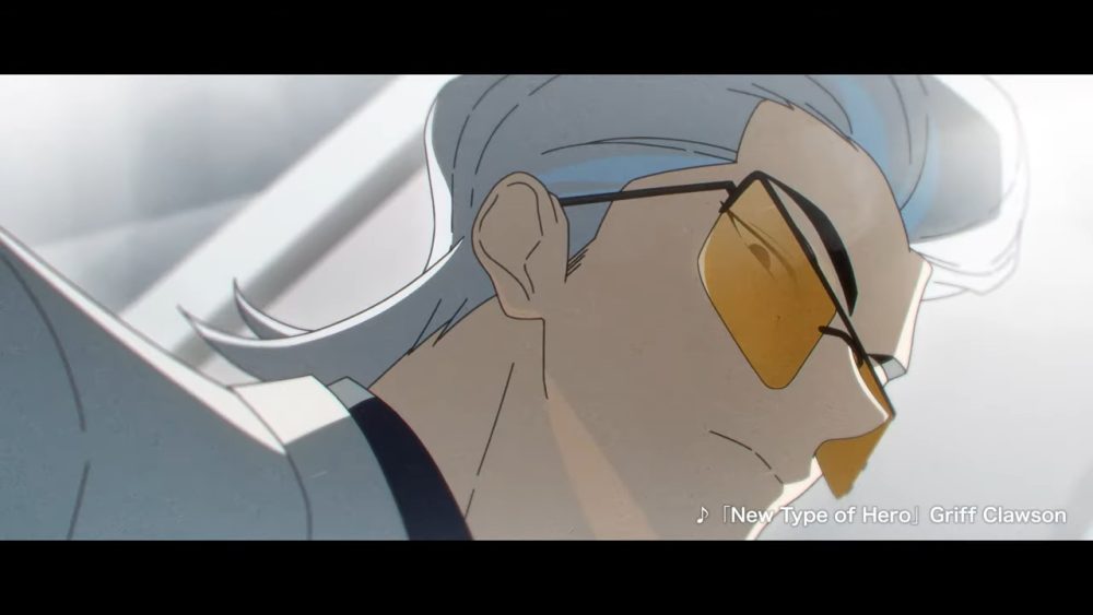 X, the number one hero. He is sneering at the camera and wearing yellow sunglasses as well as a white suit.