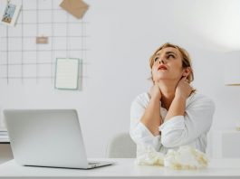 woman exhausted by paperwork