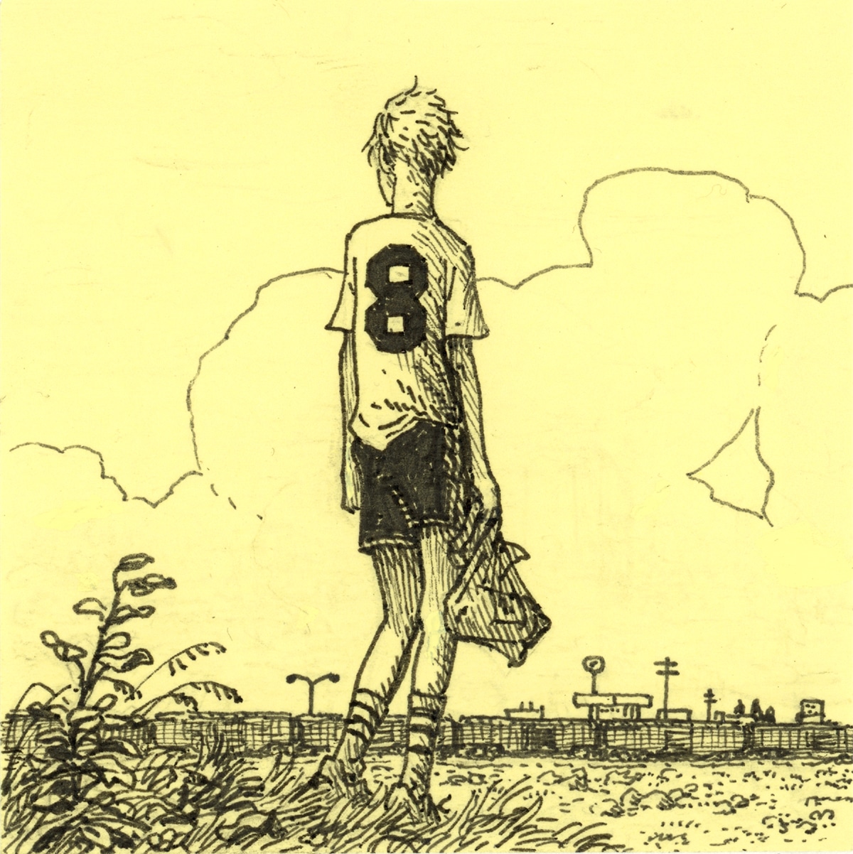 Post-It drawing of a boy in a soccer uniform, bearing the number 8