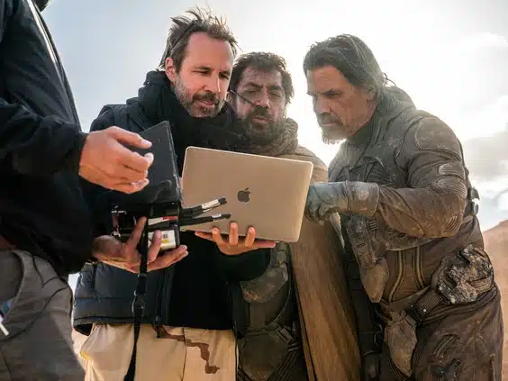Director Denis Villeneuve with Javier Bardem and Josh Brolin on the set of Dune 2.