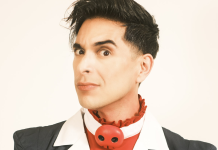 Interview: Brandon Rogers on HELLUVA BOSS and HAZBIN HOTEL Brandon Rogers in Blitzo's outfit from Helluva Boss