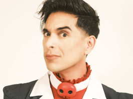 Interview: Brandon Rogers on HELLUVA BOSS and HAZBIN HOTEL Brandon Rogers in Blitzo's outfit from Helluva Boss