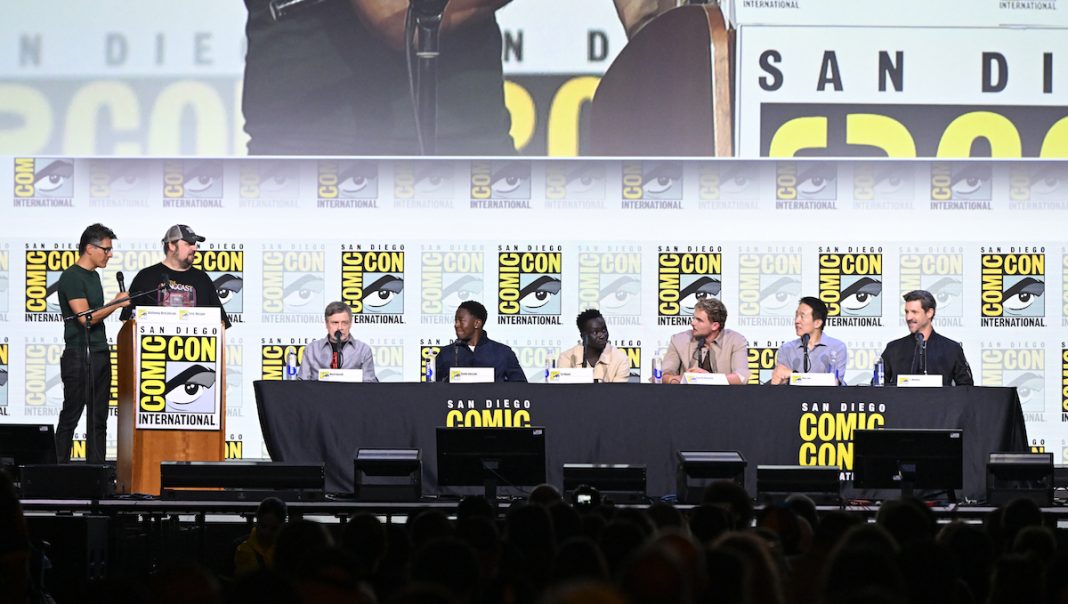 SAN DIEGO, CALIFORNIA - JULY 25: Anthony Breznican, Eric Vespe, Mark Hamill, David Jonsson, Tut Nyuot, Garrett Wareing, Roy Lee and J.T. Mollner speak during “The Long Walk” panel at San Diego Comic-Con International 2025 at San Diego Convention Center on July 25, 2025 in San Diego, California.
