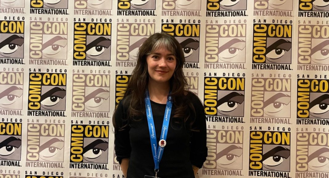 Anna Meyer in front of SDCC backdrop