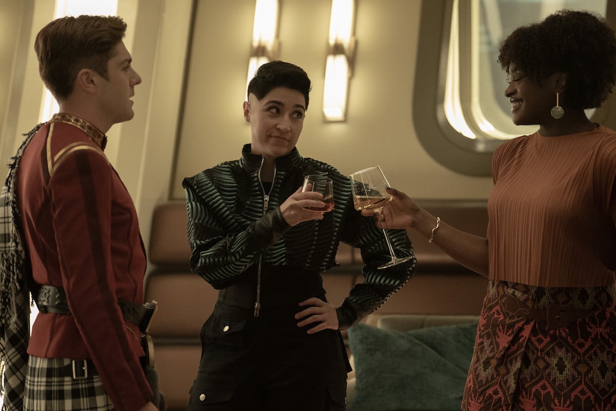 Scotty, Ortegas and Uhura at Pike's party.