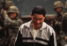 BATTLE ROYALE returns to theaters in 4K for 25th anniversary screenings Battle Royal scene with actor Beat Takeshi