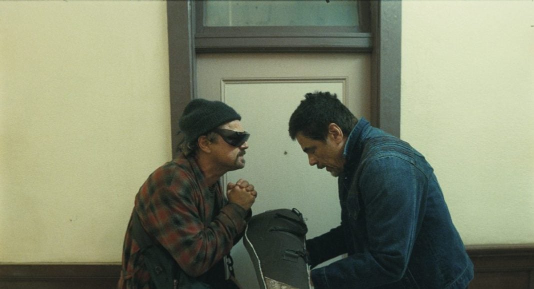 (L-r) LEONARDO DI CAPRIO as Bob Ferguson and BENICIO DEL TORO as Sensei St. Carlos in “One Battle After Another.” A Warner Bros. Pictures Release.