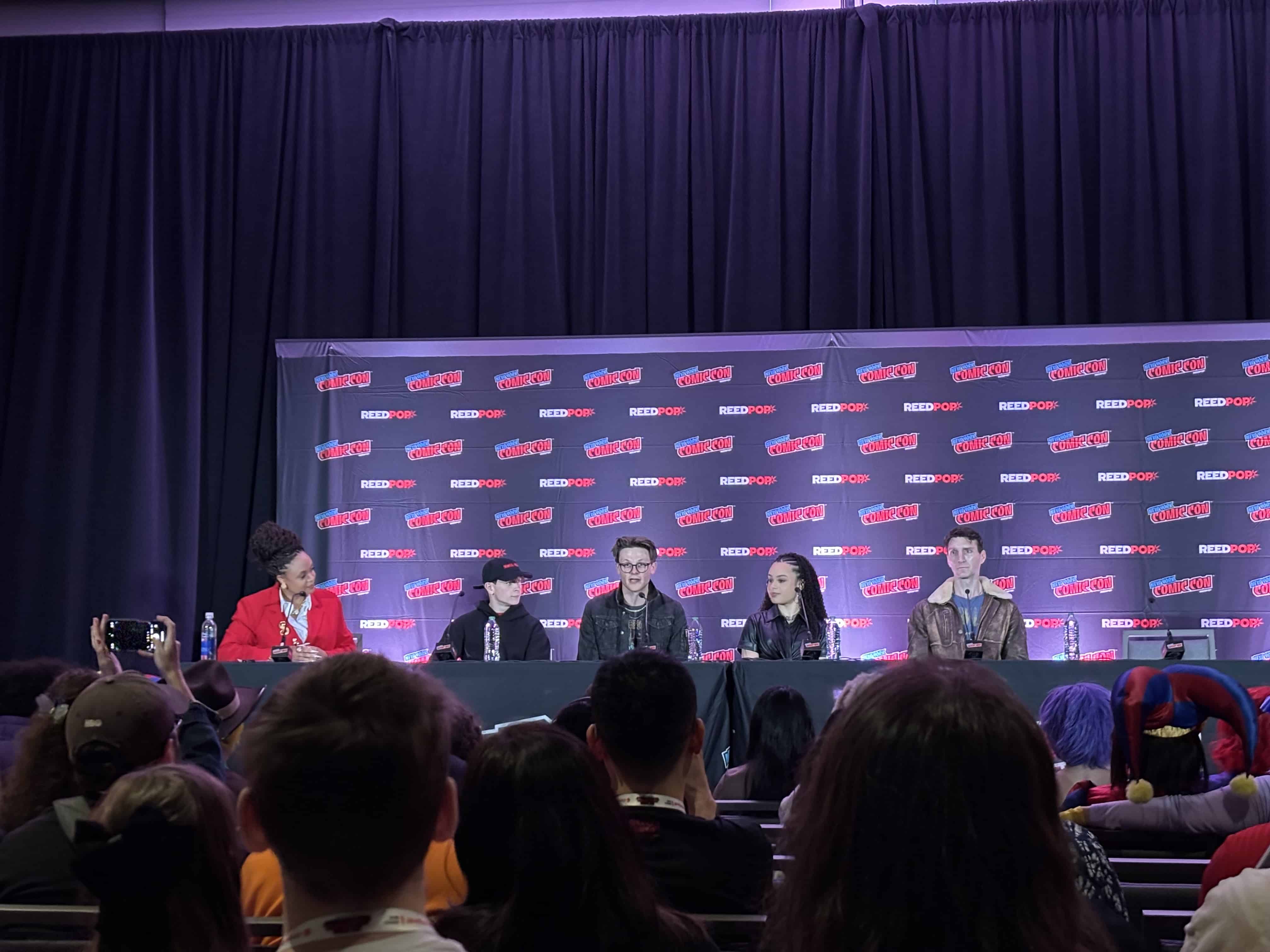 Moderator Kaisha Huguley and panelists Louis McCartney, Burke Swanson, Gabrielle Nevaeh, and Alex Breaux at the “Stranger Things: The First Shadow - Bringing Iconic Characters & the World of the Upside Down to Life on Stage” panel at NYCC ‘25.
