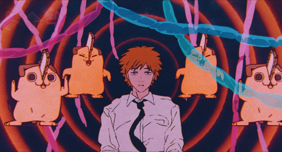 Denji seeming disillusioned as he is surrounded by four dancing Pochitas in a colorful mindscape in this promo frame from the upcoming CHAINSAW MAN MOVIE.