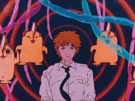 Denji seeming disillusioned as he is surrounded by four dancing Pochitas in a colorful mindscape in this promo frame from the upcoming CHAINSAW MAN MOVIE.