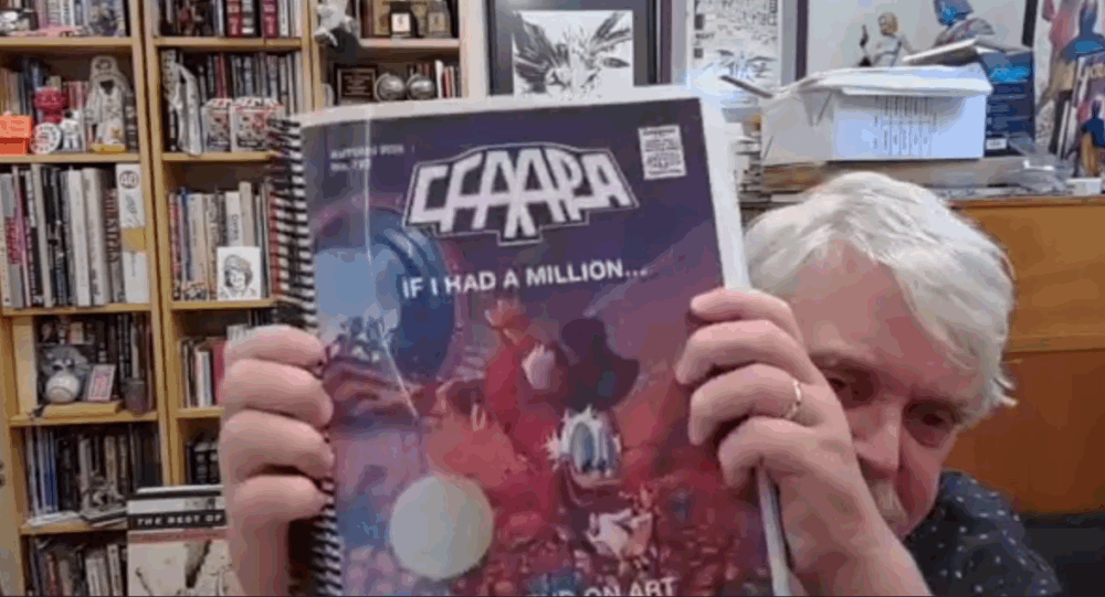 Scott Dunbier holding up the new CFA APA