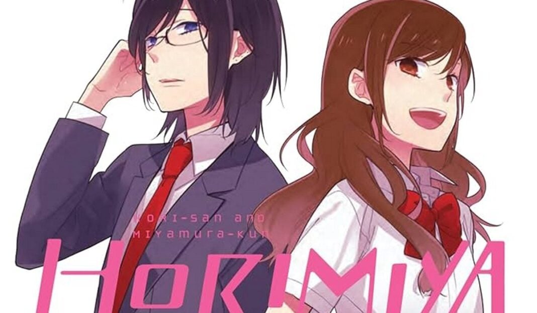 horimiya featured image Horimiya featured image. A boy and a girl stand together. The boy is wearing glasses, a red tie and has longish black hair. the girl has long brown hair and is wearing a red bow.