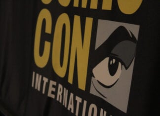 San Diego Comic-Con under fire for allowing AI at 2026’s Art Show Comic Con International logo on a black table cloth
