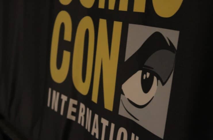 Comic Con International logo on a black table cloth