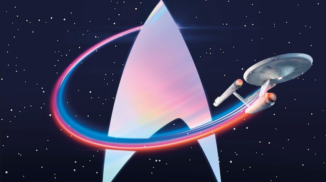 Star Trek Timelines Cover The original Enterprise (no bloody A, B, C, D, E, F or G) flies around the Starfleet delta.